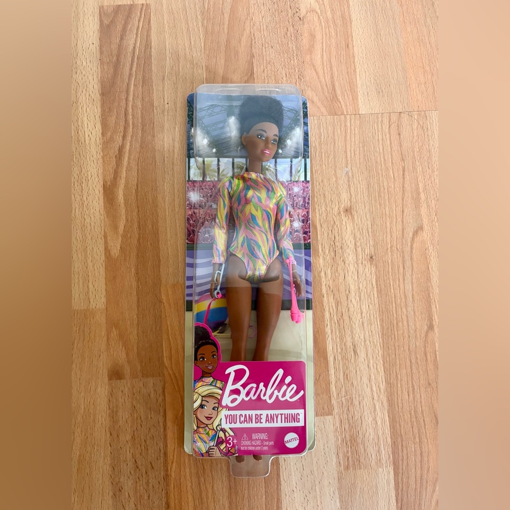 Barbie in Pink and Colorful Gymnastics Ensemble